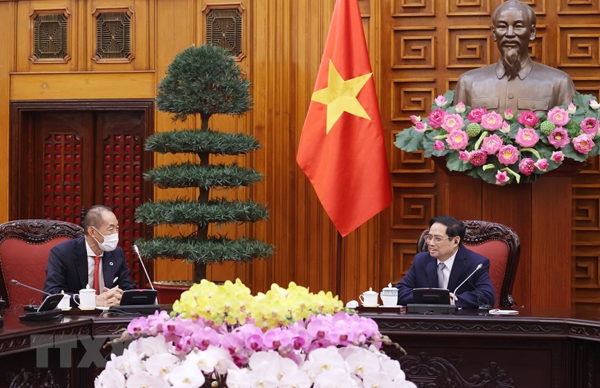 政府总理范明正会见世界卫生组织西太平洋区主任葛西健